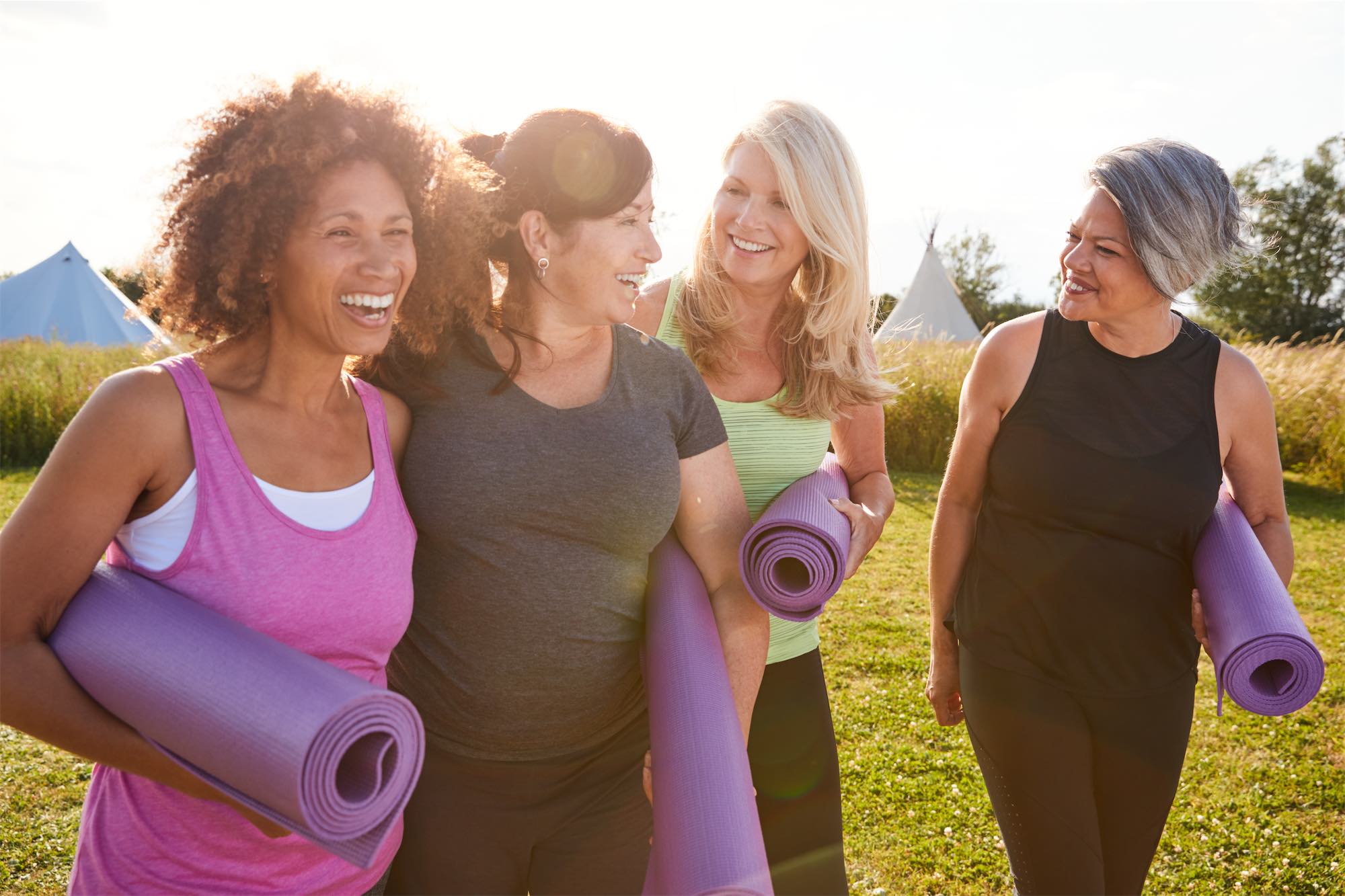 Women getting ready to go glamping